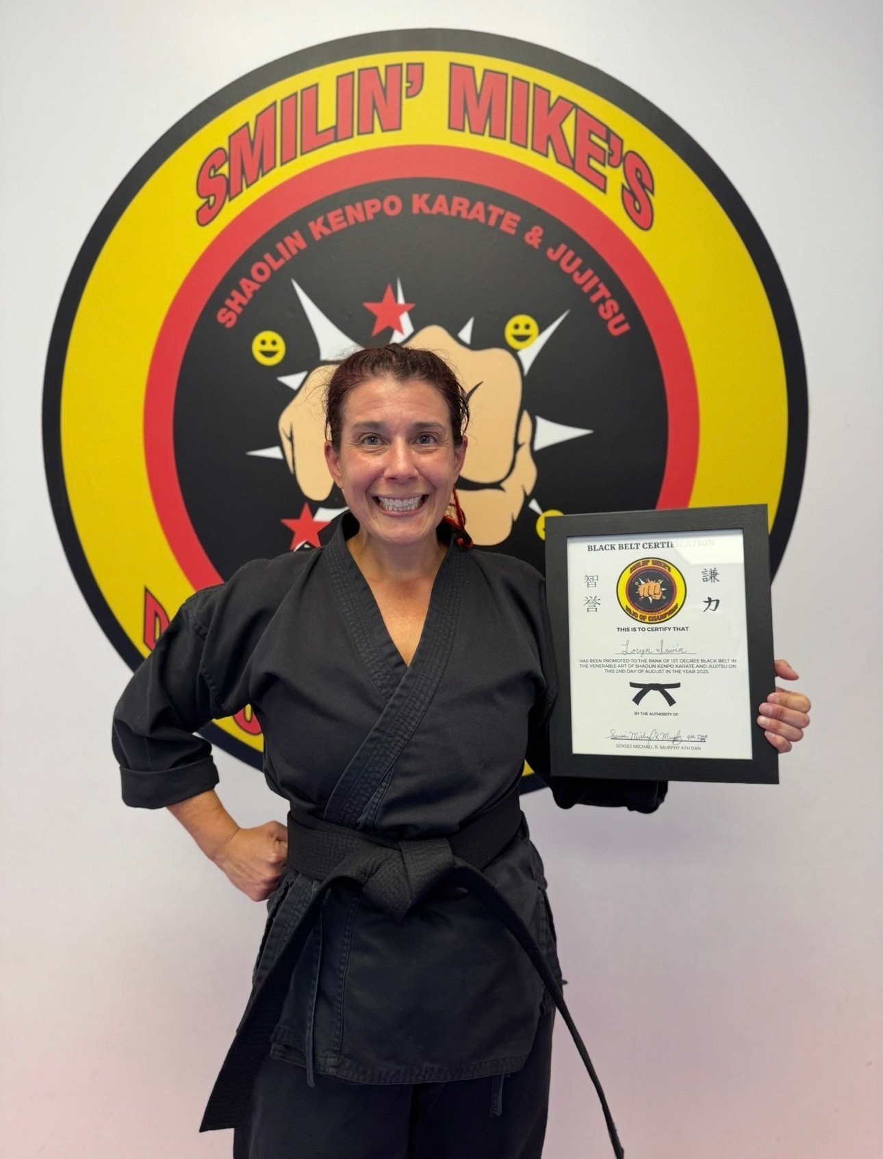 Karate students posing after class at Smilin' Mike's Dojo